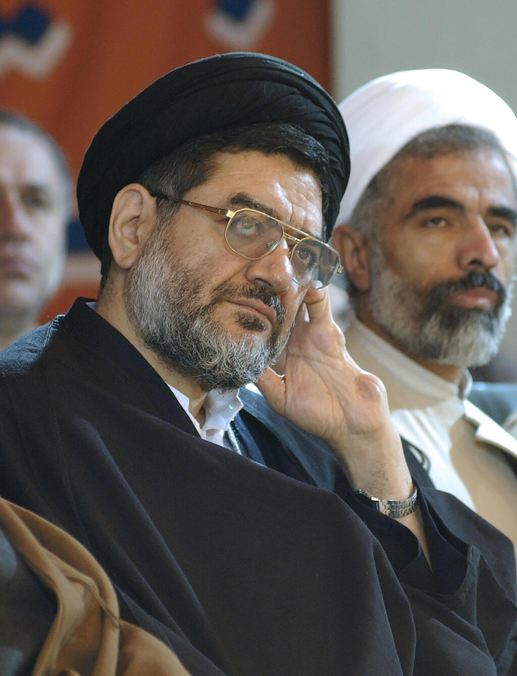 Ali Akbar Mohtashamipour listens to a speaker in a meeting in Tehran, Iran, on Dec. 4, 2003