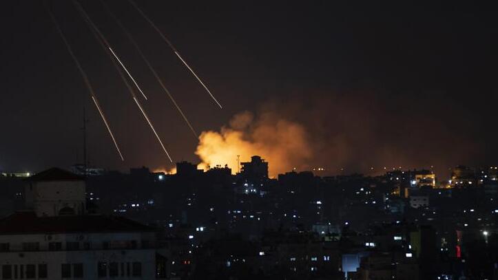 Smoke rises following Israeli missile strikes on Gaza City, Thursday, May 13, 2021 
