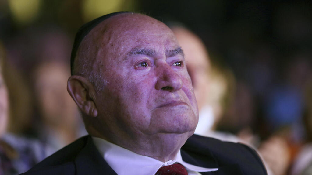David Einhorn, 95, sheds a tear as at an event held to honor Holocaust survivors in NY on Monday 