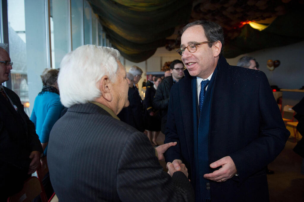 Thomas Nides meeting U.S. veterans in Belgium at a ceremony to mark the 70th anniversary of the Battle of the Bulge, Dec. 2014 