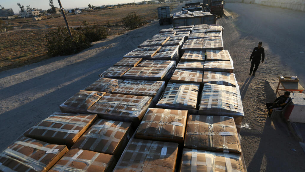 Boxes containing clothes for export are seen at Kerem Shalom crossing in Rafah in the southern Gaza Strip