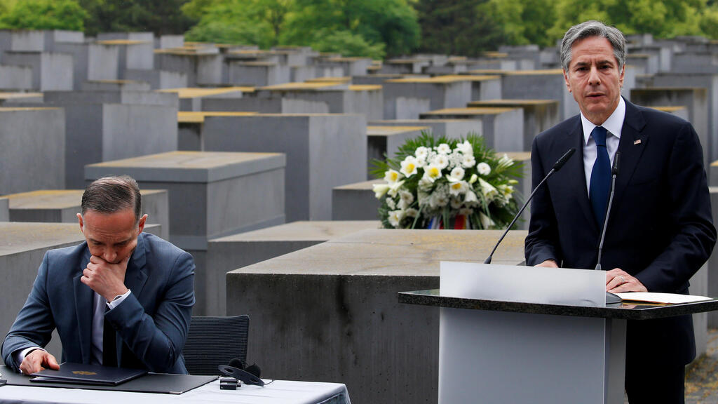 U.S. Secretary of State Blinken speaks next to German Foreign Minister Heiko Maas during a visit at Holocaust Memorial as a part of Holocaust Dialogue signing event in Berlin 
