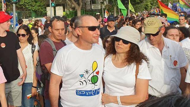 Shira Banki's parents , Uri and Mika, attending the Jerusalem Pride Parade in 2019 