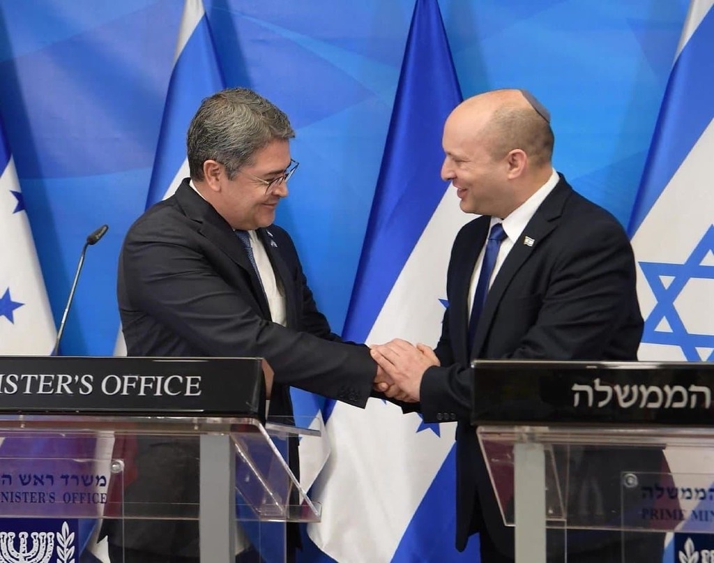 Prime Minister Naftali Bennett (R) meets with Honduras President Juan Orlando Hernandez at the Prime Minister's Office in Jerusalem 