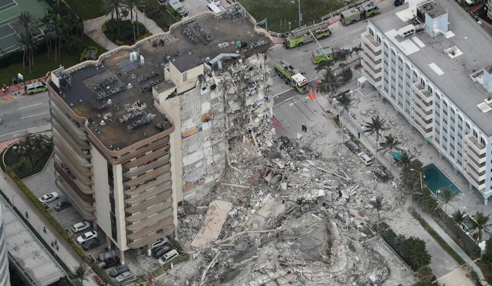 aerial photo shows part of the 12-story oceanfront Champlain Towers South Condo that collapsed early Thursday, June 24, 2021 in Surfside, Fla 