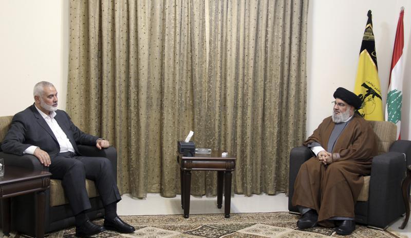 Hezbollah leader Sayyed Hassan Nasrallah, right, meeting with Ismail Haniyeh, the leader of the Palestinian militant group Hamas, in Beirut, Lebanon 