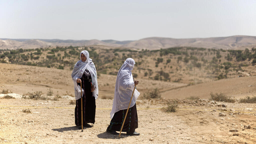 Bedouin women on a hilltop in the Negev near 
