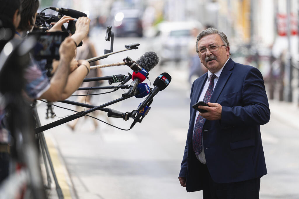 Russia's Governor to the International Atomic Energy Agency Mikhail Ulyanov speaking to reporters in Vienna in June 