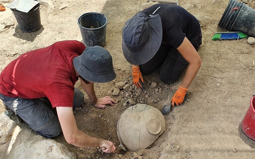 xcavating a jar from the time of the biblical Judges at Khirbet el Rai 