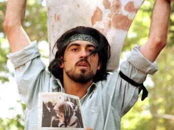 Ahmad Batebi during the 1999 student protest in Iran