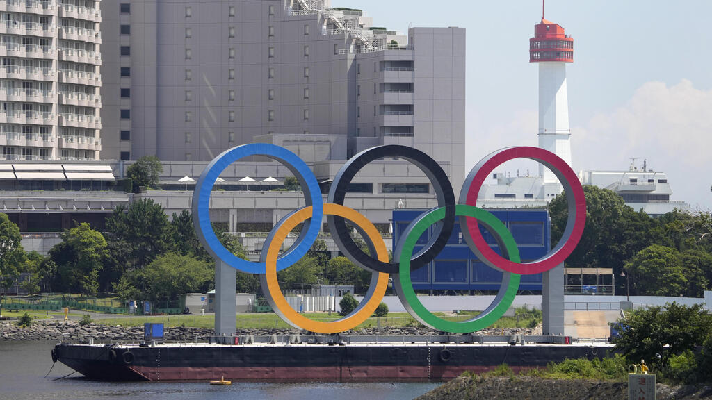 The Olympic rings float on a barge ahead of the 2020 Summer Olympics, Monday, July 19, 2021, in Tokyo
