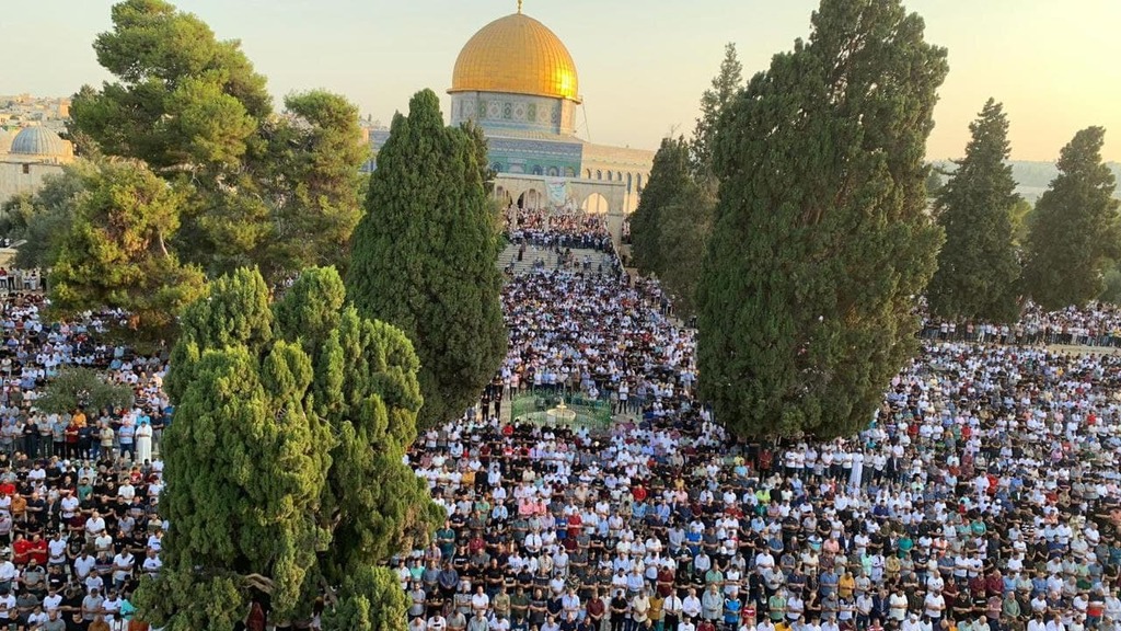 Tens of thousands of worshippers gather at Jerusalem's Al-Aqsa Mosque complex for Eid al-Adha