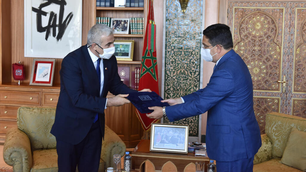 Foreign Minister Yair Lapid during his meeting with his Moroccan counterpart Nasser Bourita during his visit to Rabat earlier this month (Photo: EPA) שר החוץ יאיר לפיד נפגש ברבאט עם שר החוץ של מרוקו, נאסר בוריטה