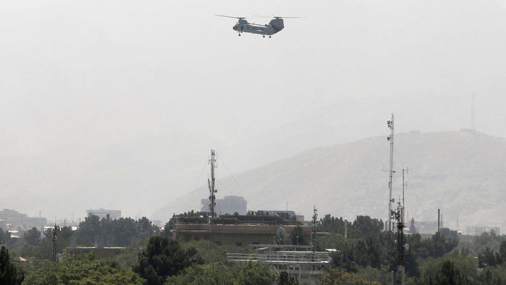 USAF CH-46 Sea Knight military transport helicopter flies over Kabul, Afghanistan August 15, 2021