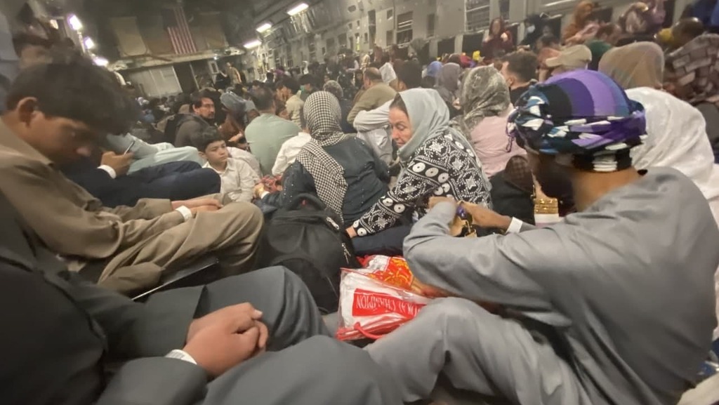  Afghans crowed into U.S. evacuation flight leaving Kabul airport on Saturday 