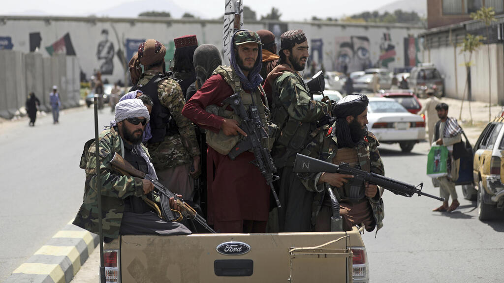 Taliban fighters in Kabul on Thursday 
