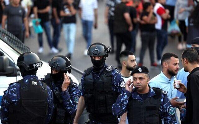 Palestinian police during demonstrations against the Palestinian Authority in June 