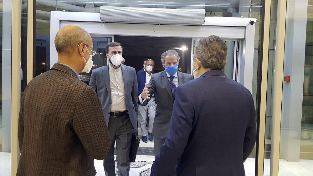 Director General of International Atomic Energy Agency, IAEA, Rafael Mariano Grossi, second right, is welcomed by Deputy Head of the Atomic Energy Organization of Iran