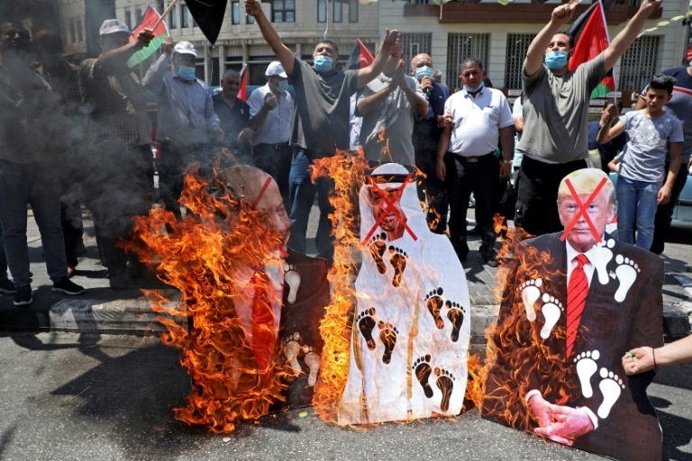 Palestinians in Ramallah protest the normalization agreement between Israel and the UAE