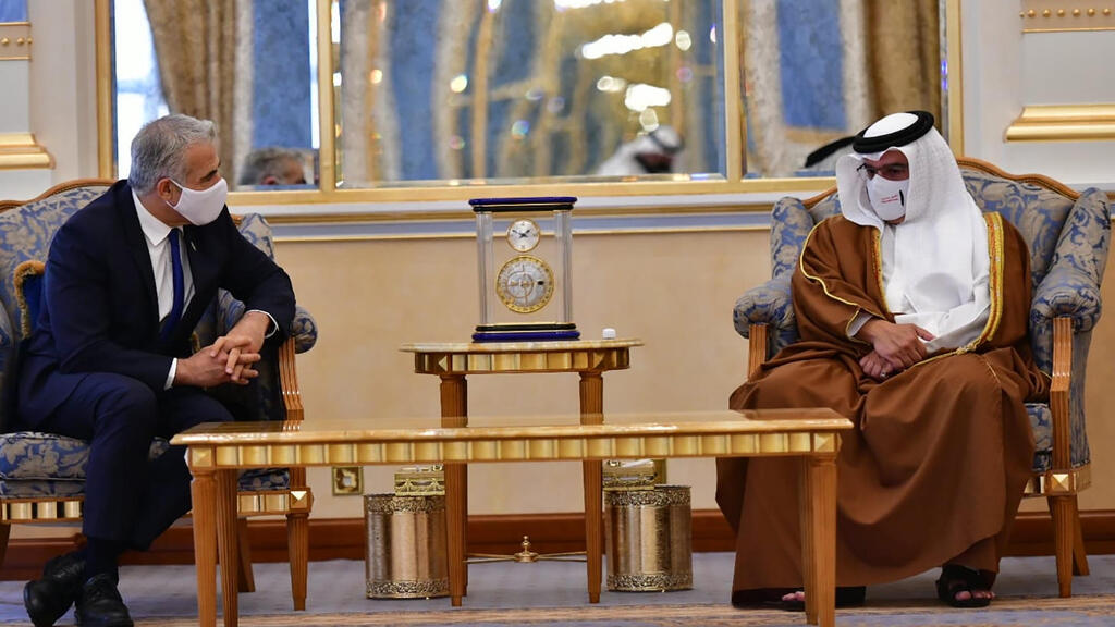 Foreign Minister Yair Lapid, left, meet with Bahrain's Crown Prince Salman bin Hamad Al Khalifa