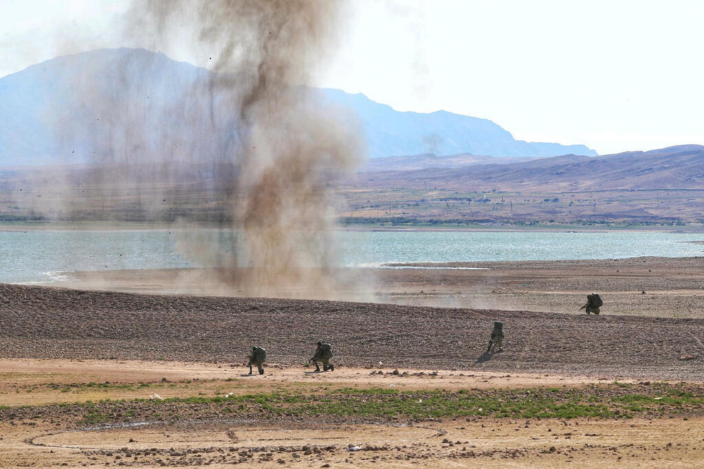 A handout photo made available by the Iranian Army office shows a military exercise by the Iranian Army in the north-west of Iran, close to the border with Azerbaijan, October 1, 2021 (Photo: EPA) Handout photo made available by the Iranian Army office shows a military exercise by the Iranian Army in the north-west of Iran, close to the border with Azerbaijan, October 1, 2021