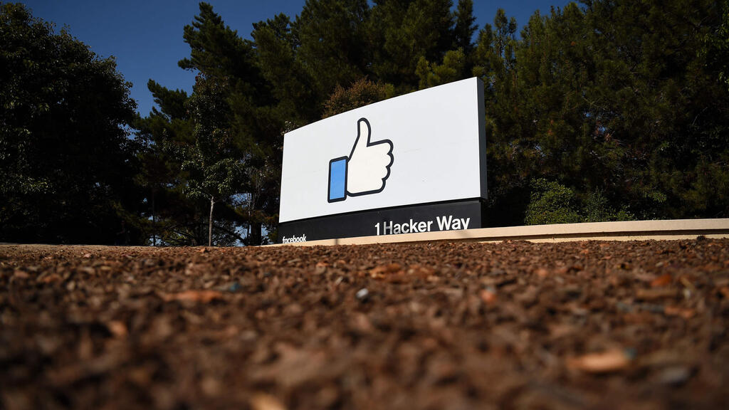  the Facebook "like" sign at Facebook's corporate headquarters campus in Menlo Park, California.