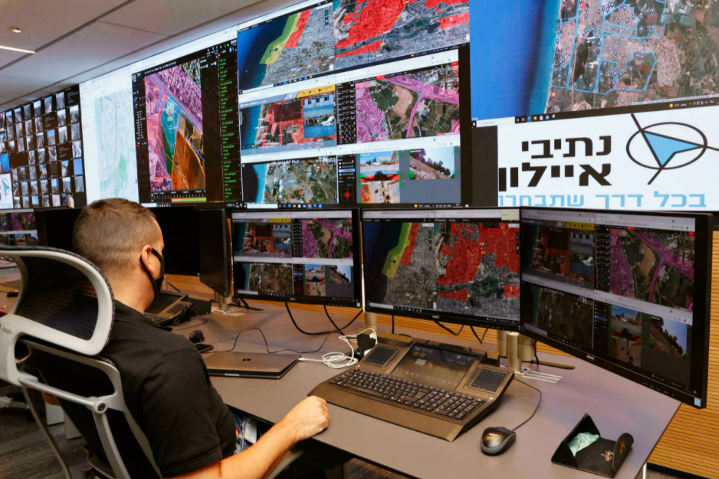 An air traffic controller monitors screens at the Drone Air Control Centre in the Israeli coastal city of Tel Aviv