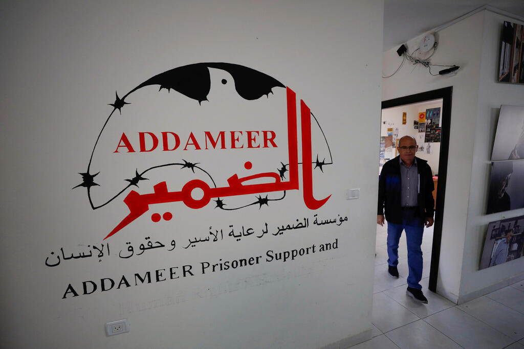 A man works inside the Palestinian civil society group Addameer, which was designated by Israel as a terrorist organization along with other five groups, in Ramallah 
