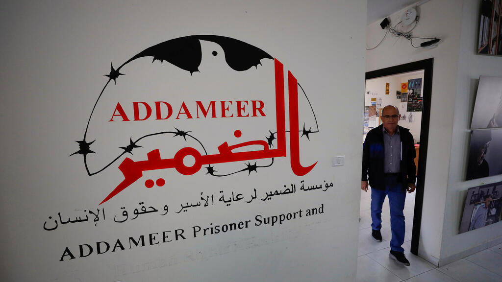 A man works inside the Palestinian civil society group Addameer, which was designated by Israel as a terrorist organization along with other five groups, in Ramallah 