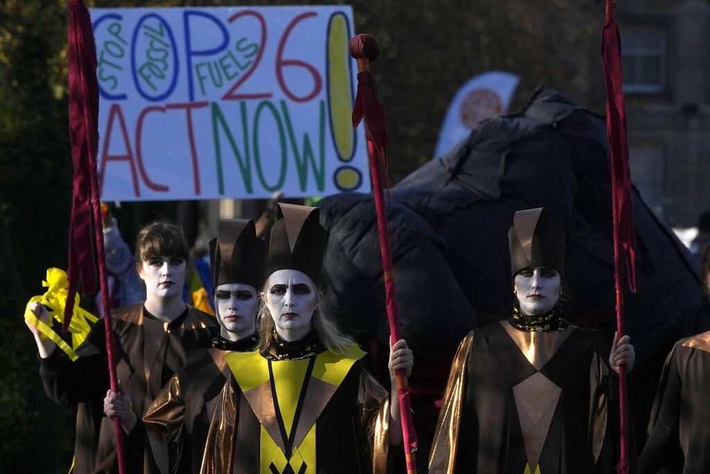 Extinction Rebellion demonstrators take part in climate change protest in Glasgow, Scotland ahead of the start of COP26