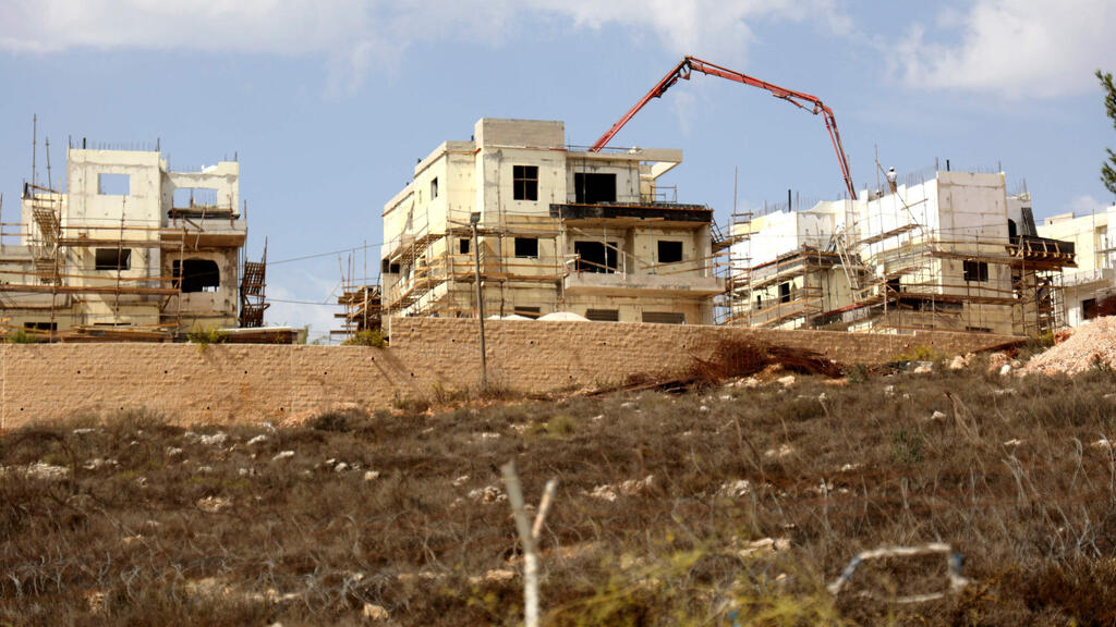 Construction in the settlement of Rehelim (Photo: AFP) construction in the Israeli settlement of Rahalim,