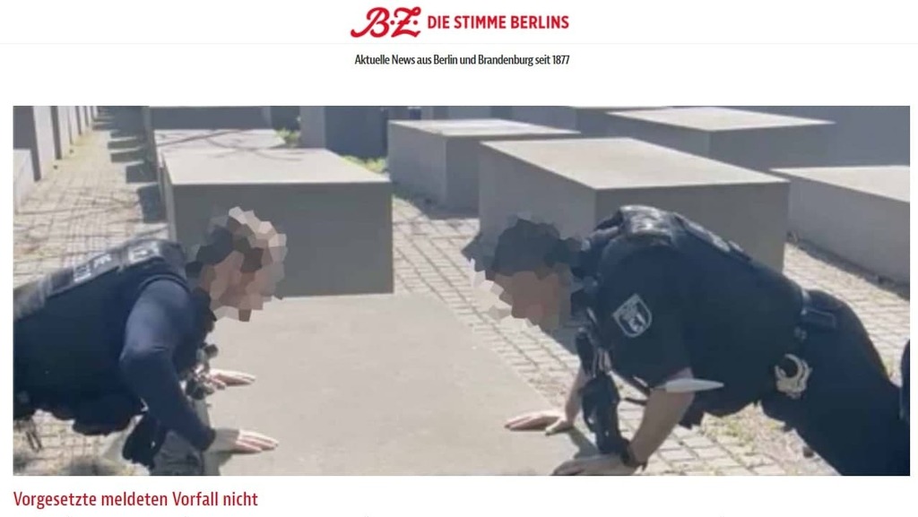 גרמניה ברלין שוטרים עושים שכיבות סמיכה על אנדרטת השואה המפקדת התנצלה מתוך הצהובון B.Z.