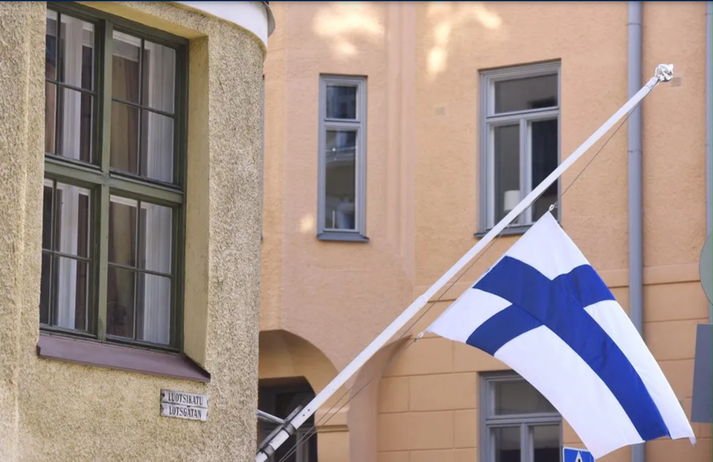 Finnish flag on the half-mast outside the home building of the former Finnish President Mauno Koivisto in Helsinki early on May 13, 2017
