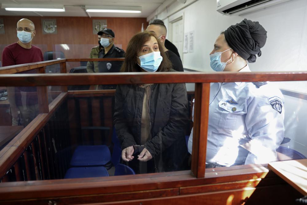Juana Ruiz Sánchez, a Spanish citizen accused of raising money for a banned Palestinian militant group, is brought to a courtroom at the Israeli Ofer military base near the West Bank city of Ramallah for sentencing on Wednesday 