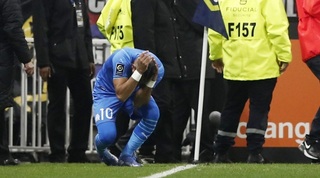 דימיטרי פאייט אחרי פגיעת הבקבוק בראשו