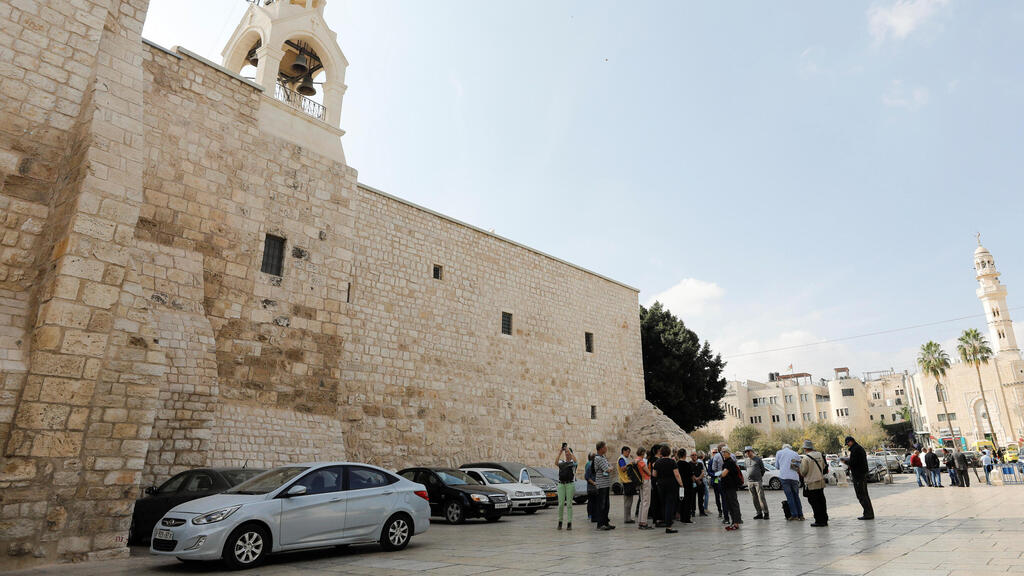Tourists in Bethlehem's Manger Square outside the Church of Nativity last week 