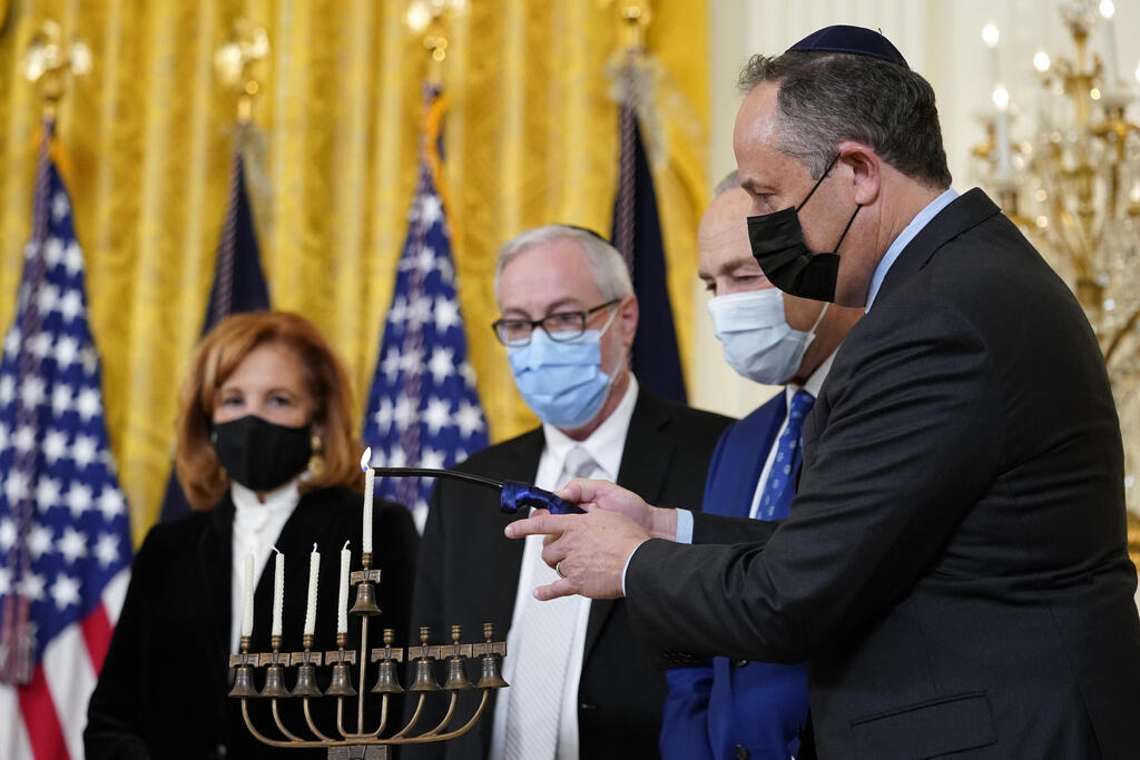 President Joe Biden delivers remarks before a menorah lighting ceremony in celebration of Hanukkah in the East Room of the White House