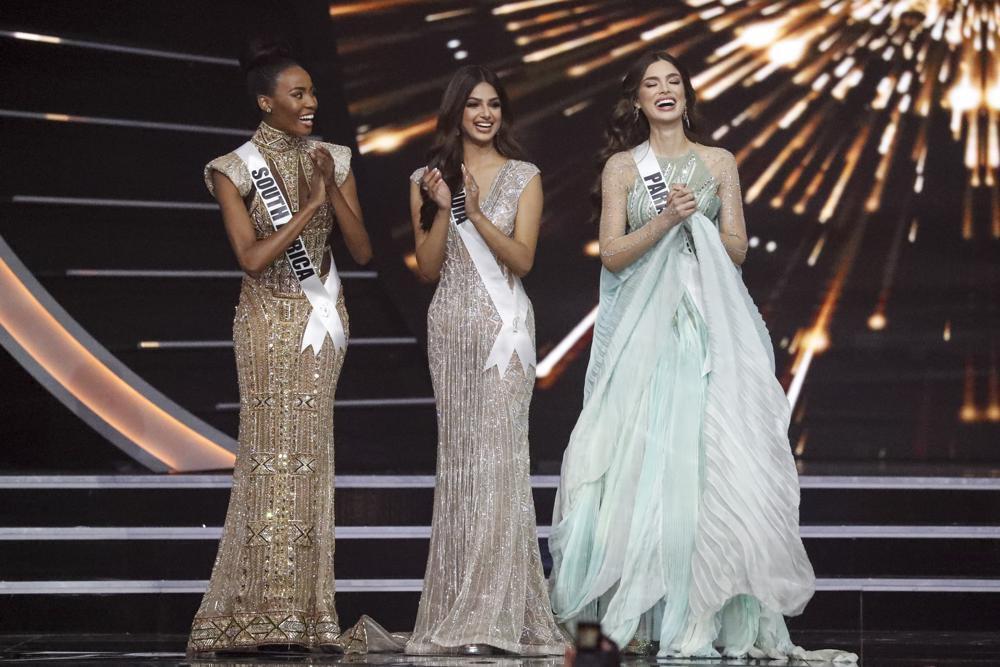 South Africa's Lalela Mswane, from left, India's Harnaaz Sandhu and Paraguay's Nadia Ferreira advance to the top 3 during the 70th Miss Universe pageant 