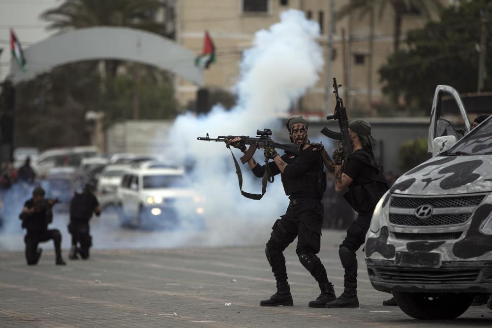 Members of the Palestinian security forces loyal to Hamas display their skills during a graduation ceremony in Gaza City 
