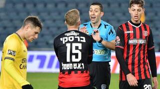 רוסלן ברסקי מתווכח עם אביעד שילוח