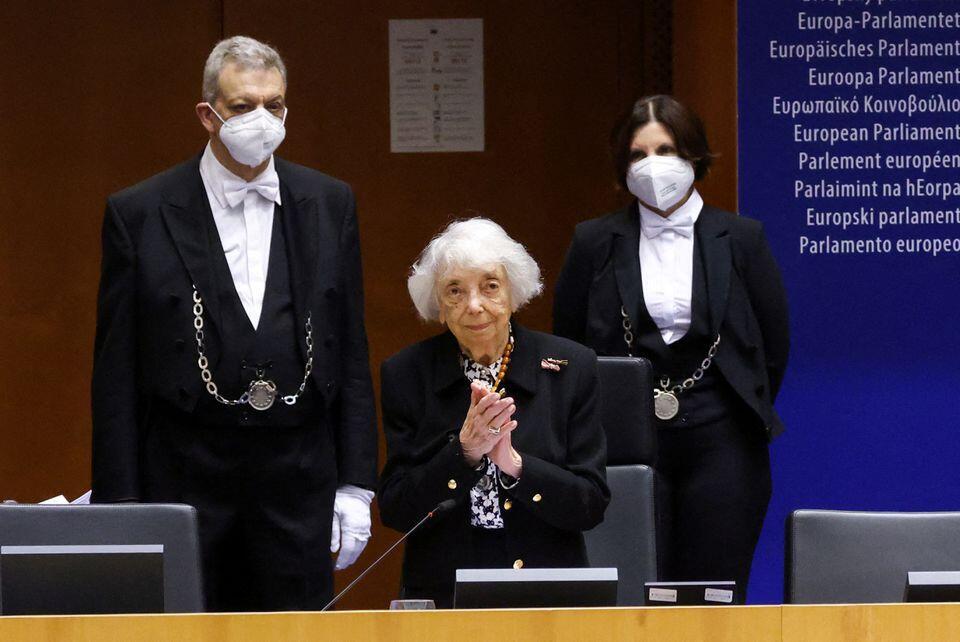 Holocaust survivor Margot Friedlander react after being applauded by members of the parliament during a special plenary session to mark Holocaust Memorial Day, at the European Parliament in Brussels,
