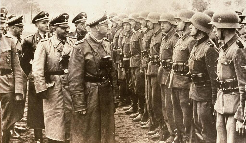 Gestapo Chief Heinrich Himmler surveying Nazi troops, 1944