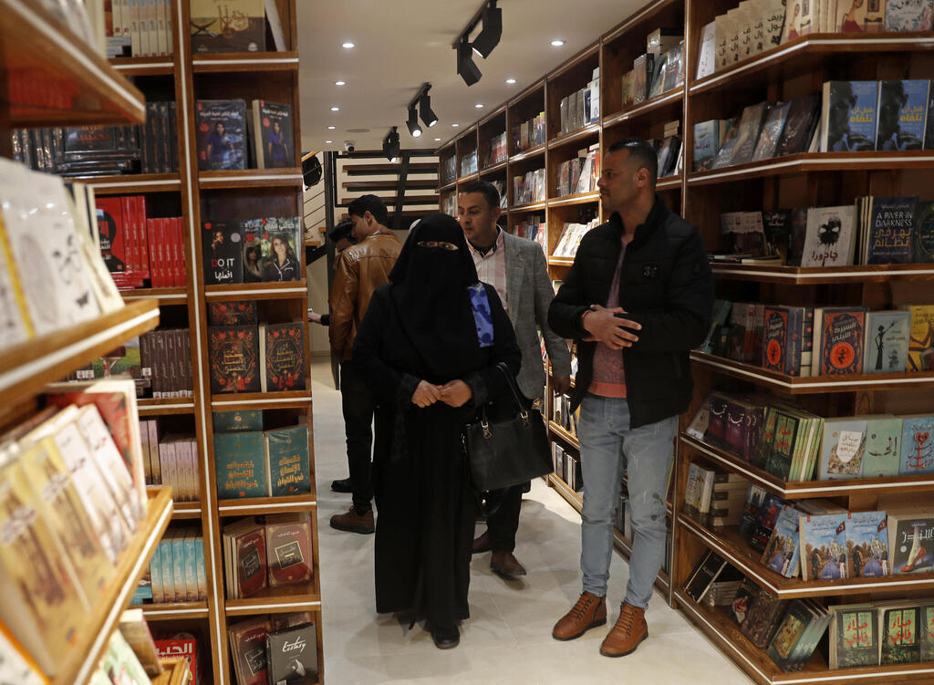 Gazans attends the reopening of the new Samir Mansour bookshop 