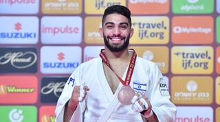 טוהר בוטבול עם המדליה