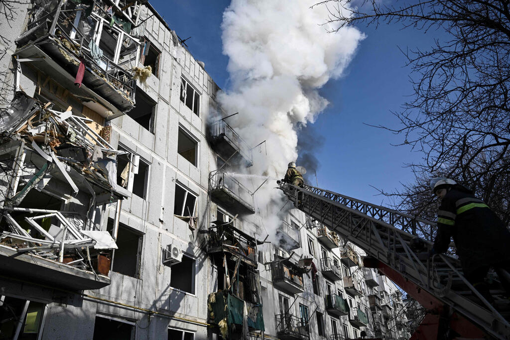 An apartment building in eastern Ukraine hit by Russian shells on Thursday 