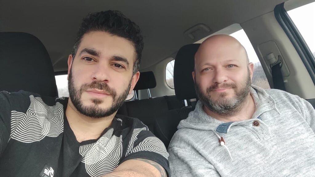 Gal Moscowitz (left) and his business partner on their way to the Ukraine border with Moldova on Friday 