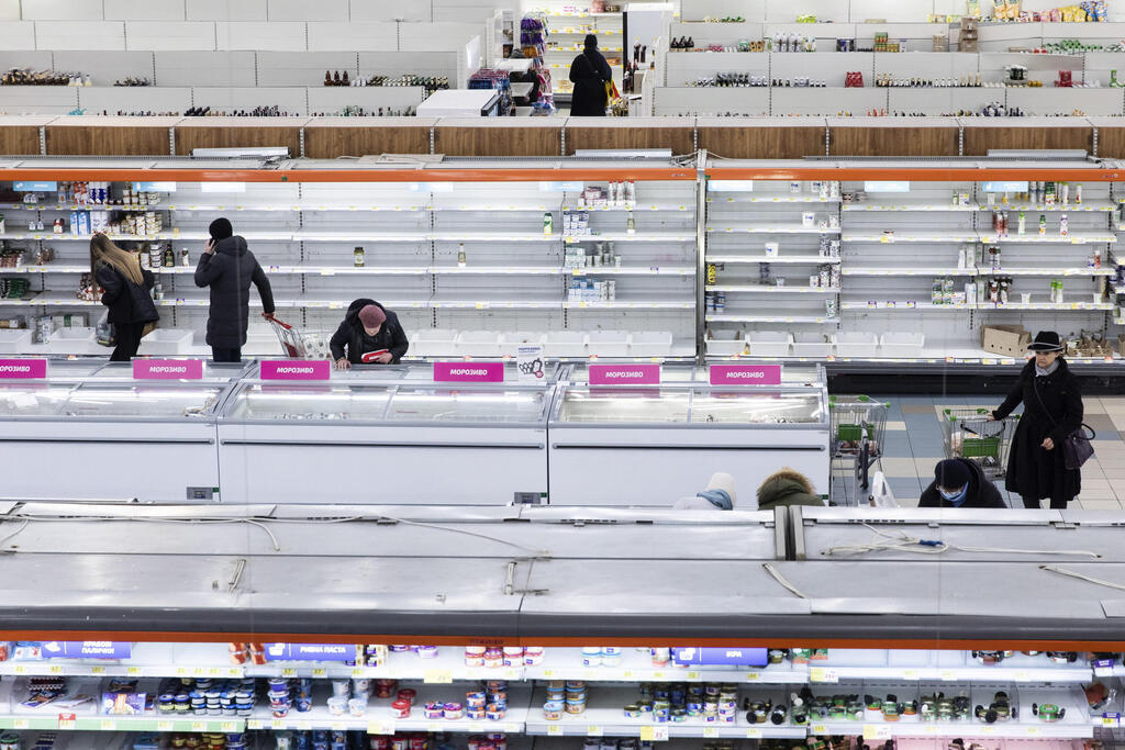 Store shelves and fridges bare amid food crisis in Kyiv 