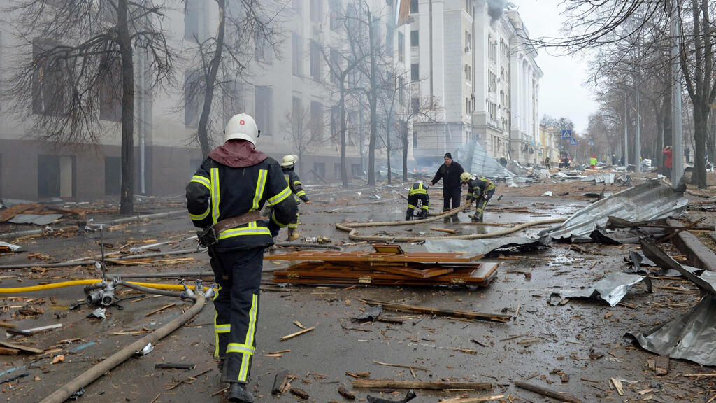Firefighters work to contain a fire at the Economy Department building of Karazin Kharkiv National University