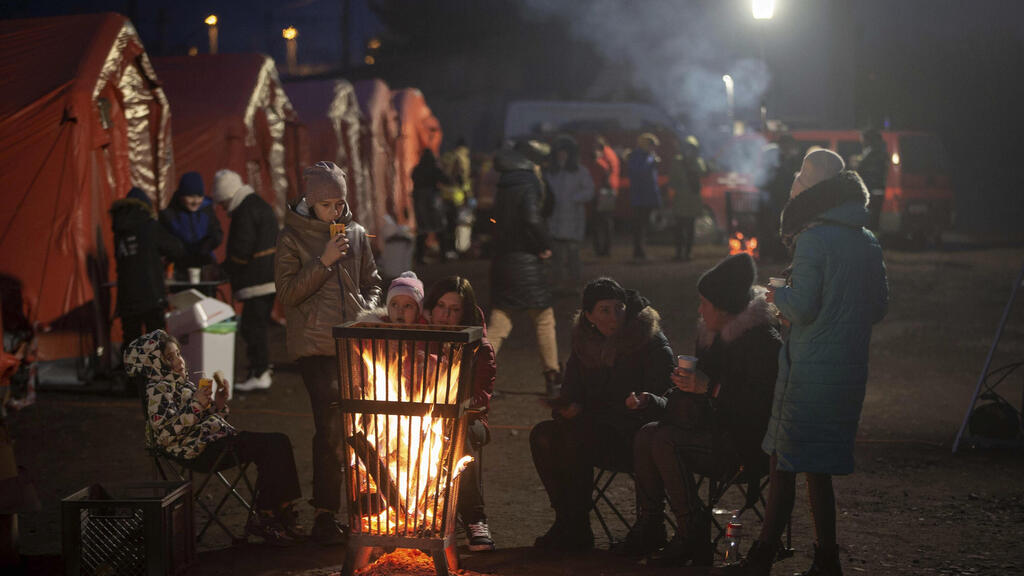 Ukrainian refugees at the Polish border (Photo: AP) פליטים אוקראינים בגבול פולין