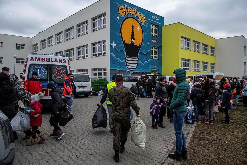 Refugees at Zamość, Poland (Photo: EPA) Refugees at Zamość, Poland